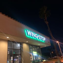 the front of a restaurant at night the front of a restaurant at night