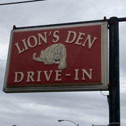 Lions Den Drive In - sign by restaurant