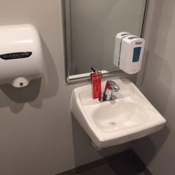 Your Laundry - Restrooms have automatic toilets, soap dispensers, taps, and hand dryers. Keys required for entry.