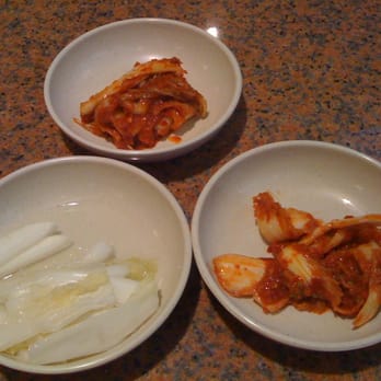 Mdk Noodles - 1 plate of white kimchi, 2 plates of the same spicy kimchi - Korean Near Me - Anaheim, California Mdk Noodles - 1 plate of white kimchi, 2 plates of the same spicy kimchi - Korean Near Me - Anaheim, California