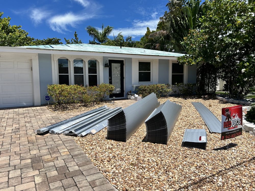 Slide of Red Pros Roofing