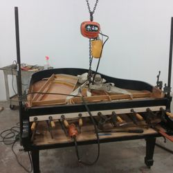 River Valley Piano Service - Gluing in a new pinblock as part of the piano rebuilding process.