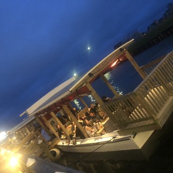 Sneaky Pete's - boat tables on water with waitress service. - Seafood Near Me - Ocean City, Maryland