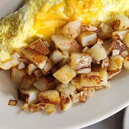 Farmer's omelet! Packed full of meat and veggies with the home style potato's and grilled onions