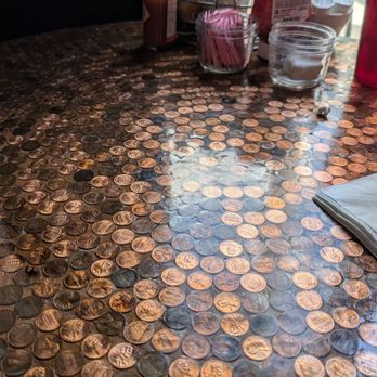 Harvest Moon Restaurant - Detail of our table with pennies under resin. - Burgers Near Me - Rockford, Washington Harvest Moon Restaurant - Detail of our table with pennies under resin. - Burgers Near Me - Rockford, Washington