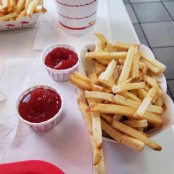 In-N-Out Burger - A basket of fries with rich fancy ketchup - Burgers Near Me - Phoenix, Arizona In-N-Out Burger - A basket of fries with rich fancy ketchup - Burgers Near Me - Phoenix, Arizona