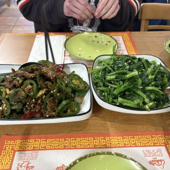 Wonton Gourmet & BBQ - On the left that is the Cumin Beef and on the right is the Sauteed Tung Choi with Minced Garlic ( Small bok choi ) - Chinese Near Me - Cleveland, Ohio Wonton Gourmet & BBQ - On the left that is the Cumin Beef and on the right is the Sauteed Tung Choi with Minced Garlic ( Small bok choi ) - Chinese Near Me - Cleveland, Ohio