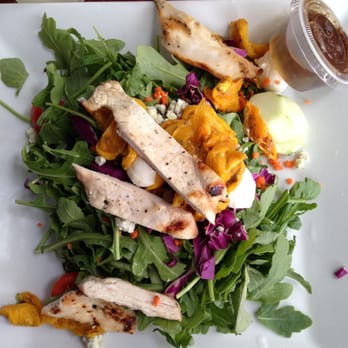 Farm Country Kitchen - Arugula salad with grilled chicken, bocconcini mozzarella, gorgonzola cheese, yellow oven roasted tomatoes, and balsamic. - American Near Me - Riverhead, New York