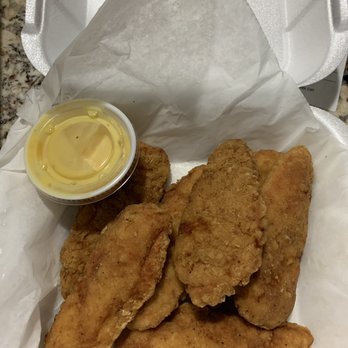 Fronte - a tray of fried chicken with a side of mustard - Pizza Near Me - Saint Petersburg, Florida Fronte - a tray of fried chicken with a side of mustard - Pizza Near Me - Saint Petersburg, Florida