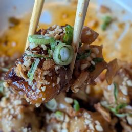 Earls Kitchen + Bar - Szechuan shrimp and pork dumplings - bbq pork, food, pork, nachos, shellfish, dumplings, +, szechuan, shrimp, szechuan shrimp + pork dumplings, shrimp dumplings, meat, pork dumplings - Canadian (New) Near Me - Etobicoke, Ontario