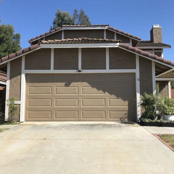 Hassle Free Painting - front garage - Painters Near Me