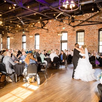 Zero Dock Street - a bride and groom having their first dance - American Near Me - Carthage, New York Zero Dock Street - a bride and groom having their first dance - American Near Me - Carthage, New York