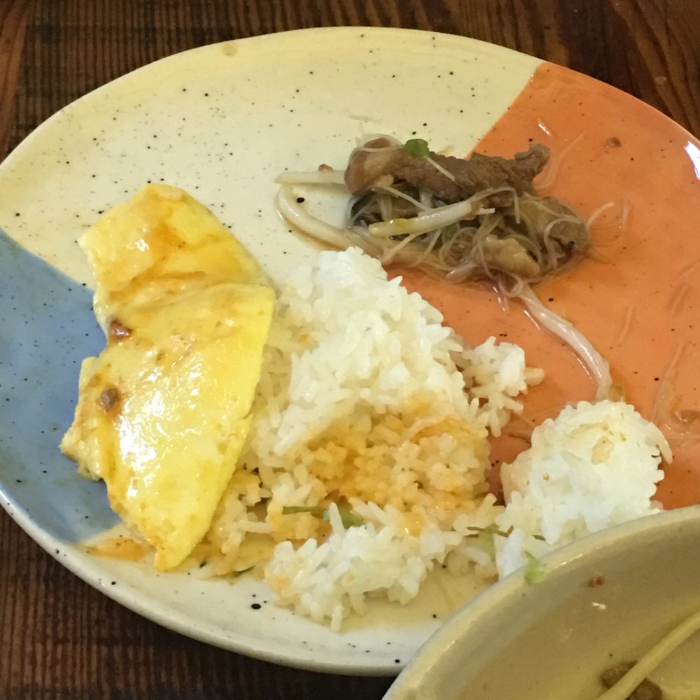 Yimm - Tom Yum Omelette A big pile of plain rice with no sauce under egg - Thai Near Me - Oakland, California Yimm - Tom Yum Omelette A big pile of plain rice with no sauce under egg - Thai Near Me - Oakland, California