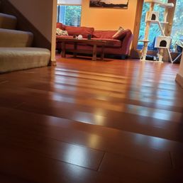 The wavy light pattern is parts of the floors rising and when walked on will drop up to 2 inches. Basically the floors are bucking up.