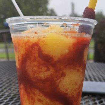Snacktopia - A Mangonada is a popular frozen drink made with sweet mangoes, spicy-tangy chamoy sauce, and Tajín. layers of sweet, salty, Spicy - Coffee & Tea Near Me - Beaverton, Oregon Snacktopia - A Mangonada is a popular frozen drink made with sweet mangoes, spicy-tangy chamoy sauce, and Tajín. layers of sweet, salty, Spicy - Coffee & Tea Near Me - Beaverton, Oregon