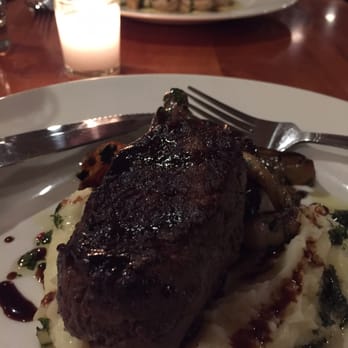 Guild Tavern - Steak cooked to perfection with a side of potatoes & roasted onions. - Steakhouses Near Me - South Burlington, Vermont Guild Tavern - Steak cooked to perfection with a side of potatoes & roasted onions. - Steakhouses Near Me - South Burlington, Vermont
