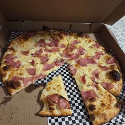 Canadian bacon and pineapple. Canadian bacon and pineapple.
