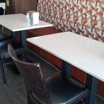 Mr Zagros - a table and chairs in a restaurant - Donairs Near Me - Vaughan, Ontario Mr Zagros - a table and chairs in a restaurant - Donairs Near Me - Vaughan, Ontario