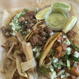 Tacos. From L to R: carnitas, chorizo, al pastor Tacos. From L to R: carnitas, chorizo, al pastor