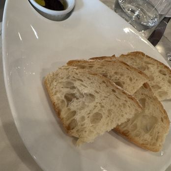 Grappolo Cucina Italiana - Complimentary bread with oil and balsamic - Italian Near Me - Winter Park, Florida Grappolo Cucina Italiana - Complimentary bread with oil and balsamic - Italian Near Me - Winter Park, Florida