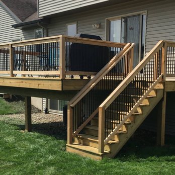 Grindstone Renovations - a deck with stairs and railings - Decks & Railing Near Me - Newport, Tennessee