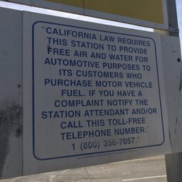This sign is posted at the SHELL gas station
