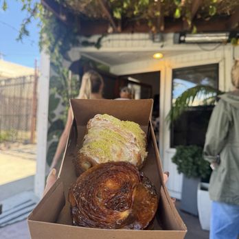 Wayfarer Bread & Pastry - Kouign Amann and pistachio strawberry croissant - Bakeries Near Me - San Diego, California Wayfarer Bread & Pastry - Kouign Amann and pistachio strawberry croissant - Bakeries Near Me - San Diego, California