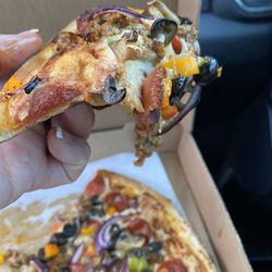 The Slab Pizza - Nice toppings but you can't hold it because they are all sliding off, crust very wet.