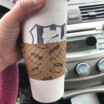 Java 101 - a hand holding a cup of coffee - Coffee & Tea Near Me - Shelton, Washington Java 101 - a hand holding a cup of coffee - Coffee & Tea Near Me - Shelton, Washington