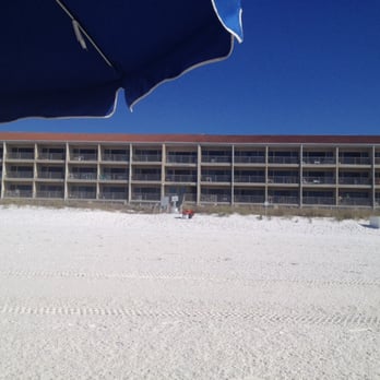 Destin Seafarer Condominiums - The view of Seafarer from our chairs & umbrella on the beach. - Condominiums Near Me - Destin, Florida Destin Seafarer Condominiums - The view of Seafarer from our chairs & umbrella on the beach. - Condominiums Near Me - Destin, Florida
