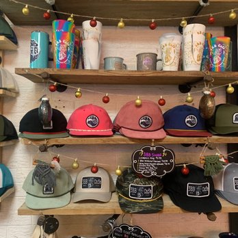 3BB Café - a shelf of hats and other items - Bakeries Near Me - Bethany Beach, Delaware