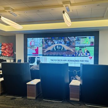 Delta Sky Club - Concourse T - Big screen tv and seating - Airport Lounges Near Me - Atlanta, Georgia Delta Sky Club - Concourse T - Big screen tv and seating - Airport Lounges Near Me - Atlanta, Georgia
