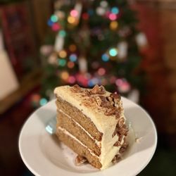8th Street Ale House - House made carrot cake with cinnamon cream cheese frosting and candied pecans.