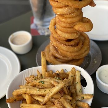Yard House - Truffle Fries & Onion Ring Tower** - New American Near Me - San Jose, California Yard House - Truffle Fries & Onion Ring Tower** - New American Near Me - San Jose, California