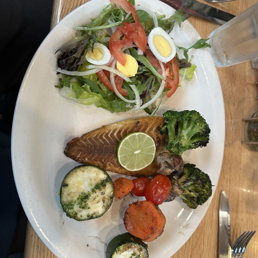 El Patio - Branzino with side salad and vegetables. - Argentine Near Me - Rockville, Maryland El Patio - Branzino with side salad and vegetables. - Argentine Near Me - Rockville, Maryland