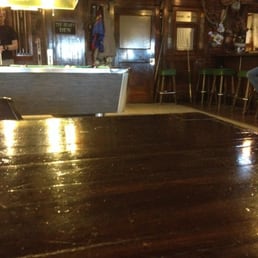 Does have neat old time bank window next to the bar and pool table. Does have neat old time bank window next to the bar and pool table.
