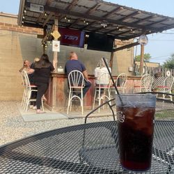 Corner Bar - Drinks and hockey on the patio.