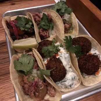 Bartaco Mosaic - From left to right:  (Top) Glazed Pork Belly Taco, 2 Mojo Pork Carnitas Tacos (Bottom) Mojo Pork Carnitas Taco, 2 Falafel Tacos - Tacos Near Me - Fairfax, Virginia