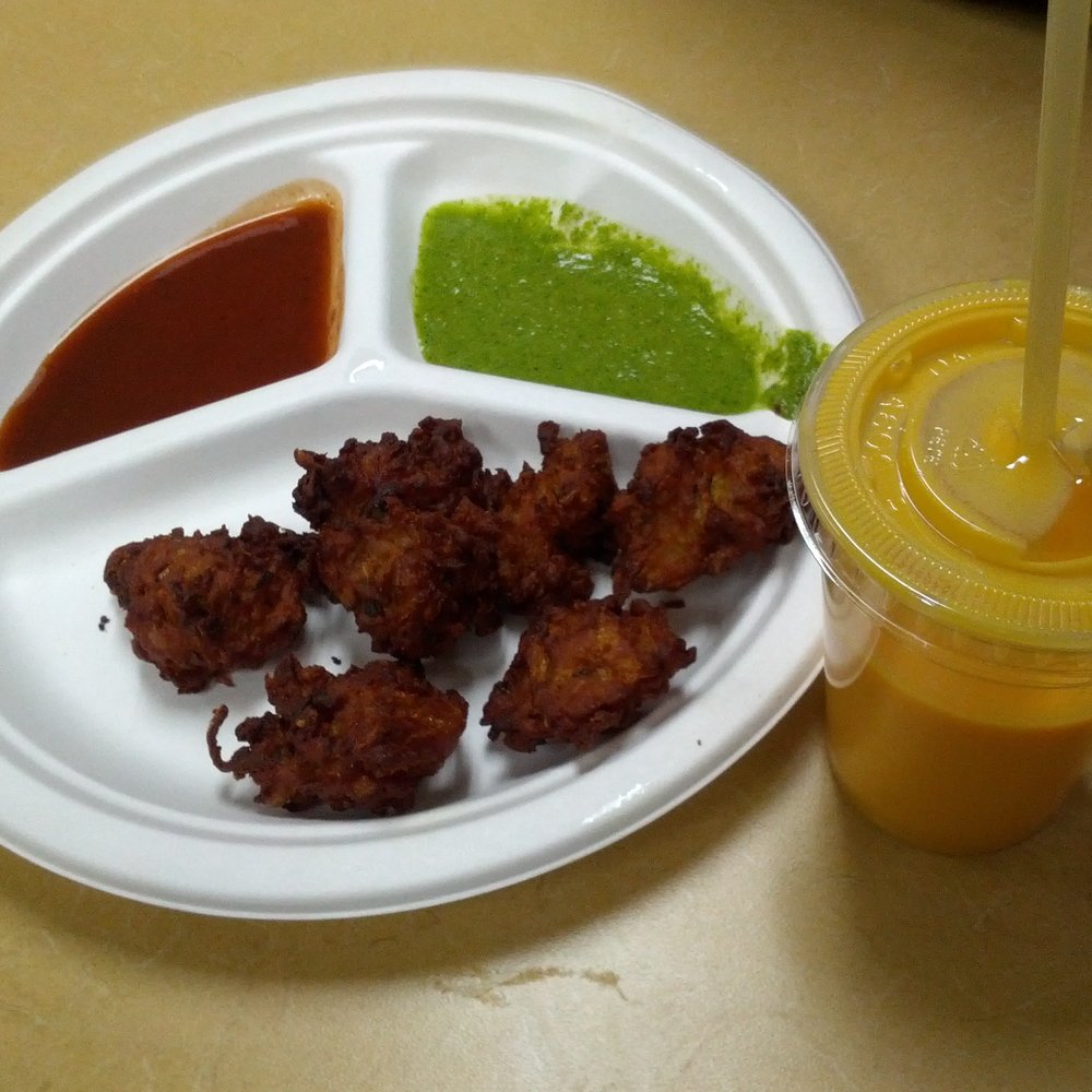 Dosa Hutt - Onion Pakoras with Mango Lassi - Indian Near Me - Flushing, New York Dosa Hutt - Onion Pakoras with Mango Lassi - Indian Near Me - Flushing, New York