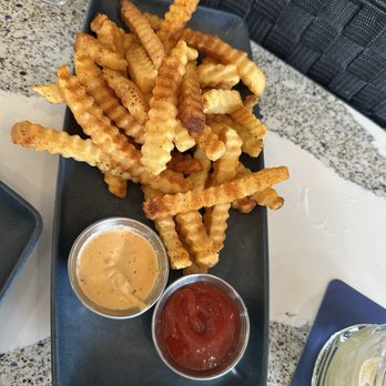 Tommy Bahama Marlin Bar - Cajun crinkle fries - New American Near Me - Charlotte, North Carolina Tommy Bahama Marlin Bar - Cajun crinkle fries - New American Near Me - Charlotte, North Carolina