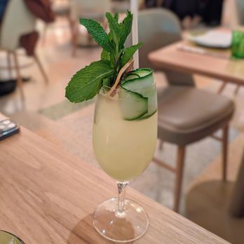 Acadia - a glass of lemonade and cucumber on a table - Mediterranean Near Me - New York, New York