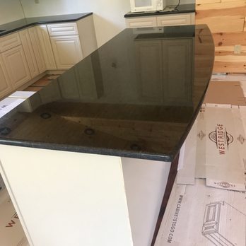 Granite Works - a kitchen counter being installed - Flooring Near Me - Portage, Michigan Granite Works - a kitchen counter being installed - Flooring Near Me - Portage, Michigan