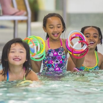 Fife Aquatic Center - Kids in the 2 foot deep teaching pool. Water temperature is a warm 90 degrees! - Swimming Pools Near Me - Fife, Washington