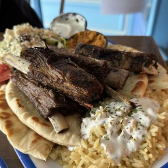 Yamas Greek Eatery - $21 PAIDAKIA (LAMB RIBS): these were delicious! It comes with so much food if you order the plate. A little bit of everything. - Greek Near Me - Walla Walla, Washington Yamas Greek Eatery - $21 PAIDAKIA (LAMB RIBS): these were delicious! It comes with so much food if you order the plate. A little bit of everything. - Greek Near Me - Walla Walla, Washington