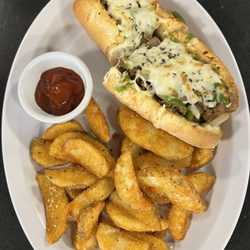 Home Slice Pizzeria - Philly cheesesteak with seasoned potatoes