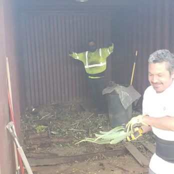Moving Gurus & Junk Removal - Getting the container cleaned out and putting trash into a dumpster - Junk Removal & Hauling Near Me Moving Gurus & Junk Removal - Getting the container cleaned out and putting trash into a dumpster - Junk Removal & Hauling Near Me