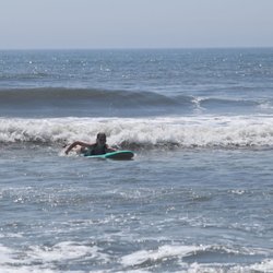 Sommers Surf Lessons - Paddling to catch my own wave
