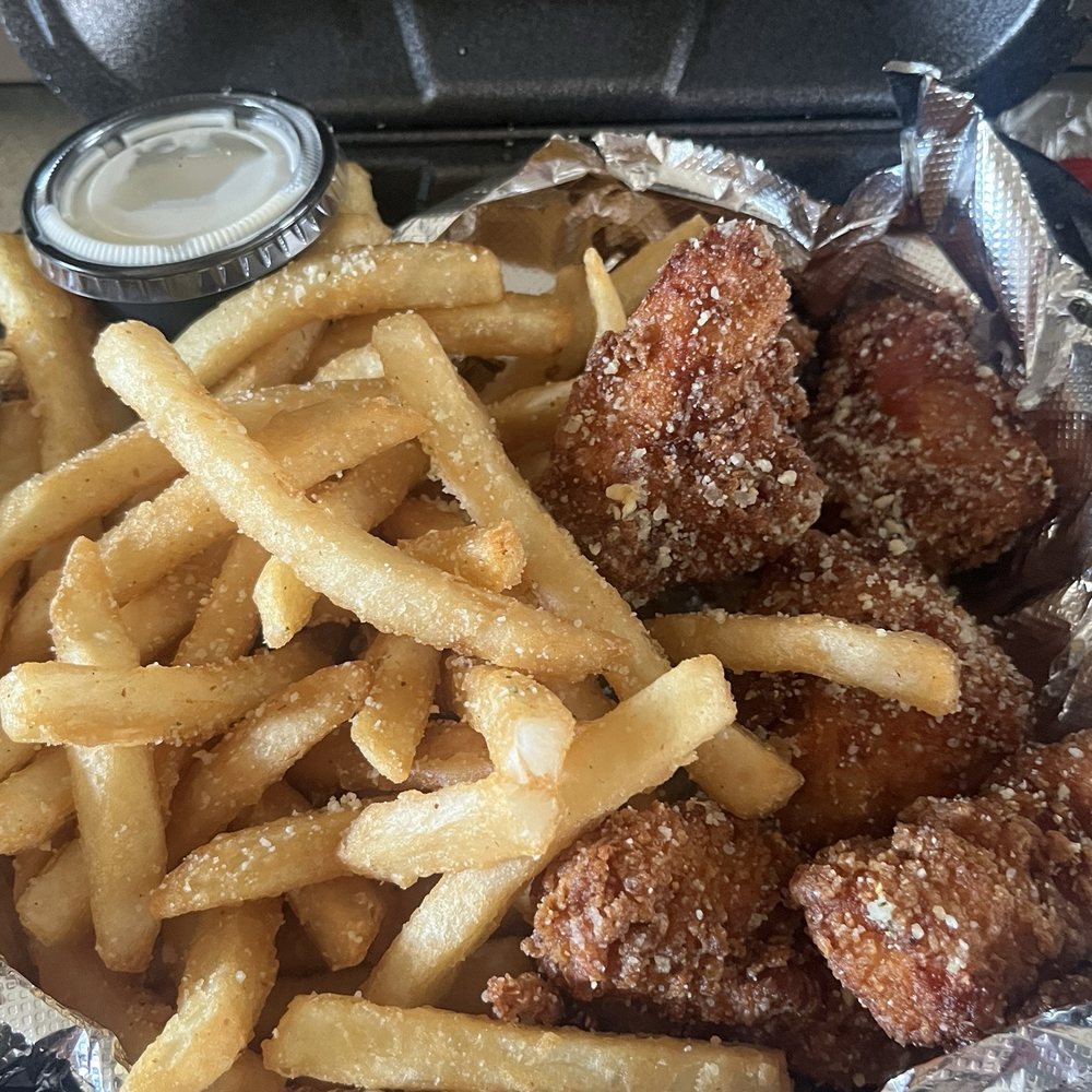 Wingfellas - 5 piece garlic Parmesan wing fingers, garlic Parmesan fries, with ranch dipping sauce. All well seasoned. - Chicken Wings Near Me - Wyandotte, Michigan Wingfellas - 5 piece garlic Parmesan wing fingers, garlic Parmesan fries, with ranch dipping sauce. All well seasoned. - Chicken Wings Near Me - Wyandotte, Michigan