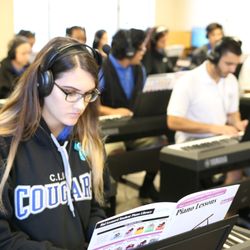 Cobalt Institute of Math and Science - CIMS has a music program that includes keyboarding and band instruments.