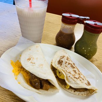 Santos Cafe - Horchata, carne guisada with cheese flour, bean and egg corn. Red and green salsa. - Mexican Near Me - San Antonio, Texas Santos Cafe - Horchata, carne guisada with cheese flour, bean and egg corn. Red and green salsa. - Mexican Near Me - San Antonio, Texas